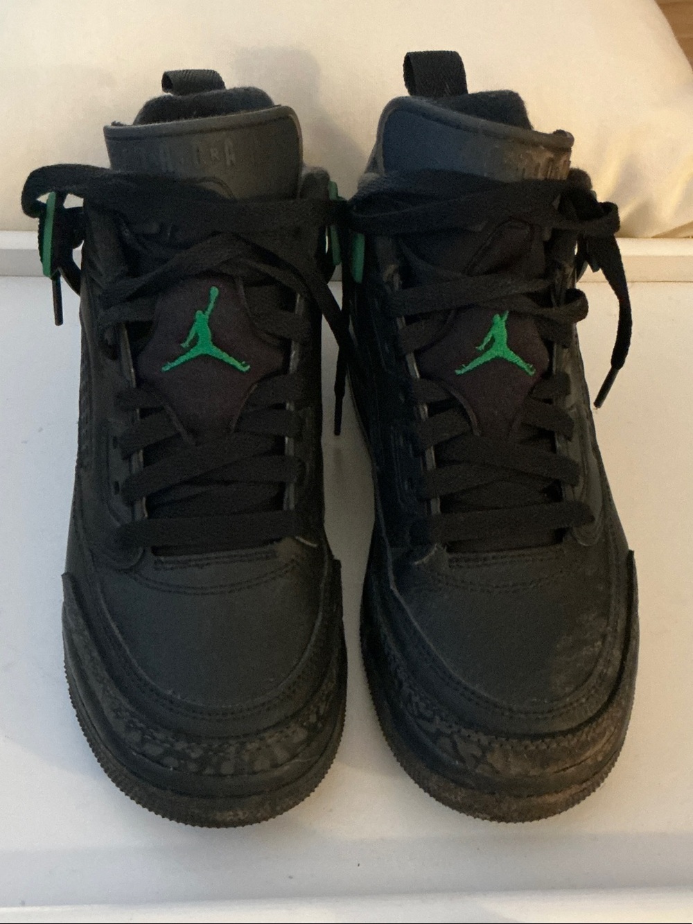 JORDANS Kids Black Sneakers with Green Jumpman Accent 4 1/2Y